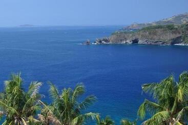 هتل Puri Bunga Beach Cottages