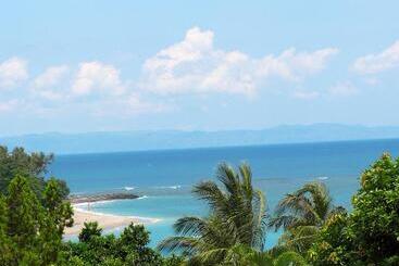 هتل Puri Bunga Beach Cottages