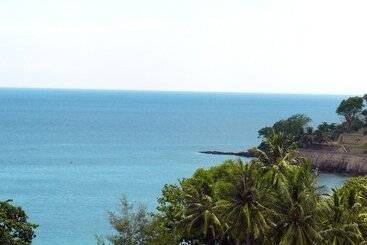 هتل Puri Bunga Beach Cottages