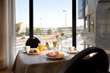 酒店 Exe Sevilla Palmera
