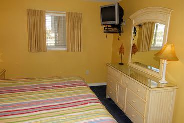 هتل Resortquest Rentals At Crystal Sands East & West