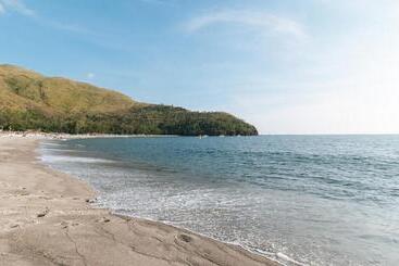 هتل Reddoorz Hostel At Megans Paradisio Beach Resort