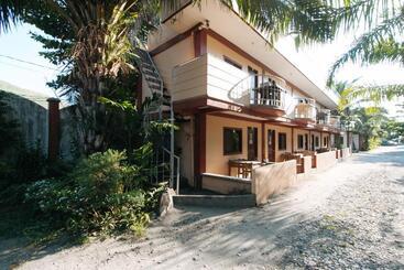 هتل Reddoorz Hostel At Megans Paradisio Beach Resort