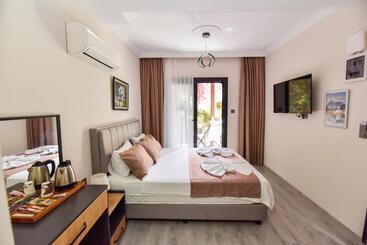 تختخواب و صبحانه Mykonut Boutique Suites