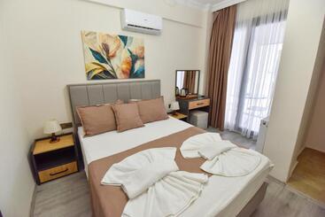 تختخواب و صبحانه Mykonut Boutique Suites