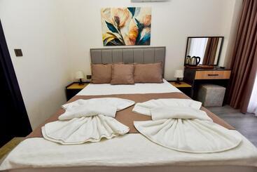 تختخواب و صبحانه Mykonut Boutique Suites