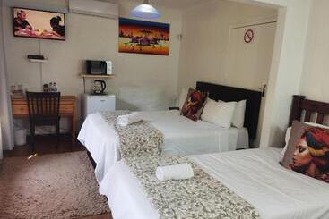 تختخواب و صبحانه Libra Lodge
