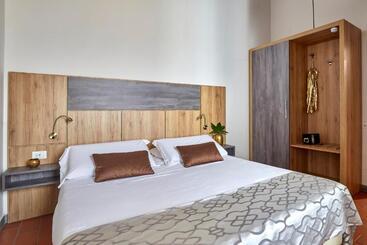 تختخواب و صبحانه Sette Angeli Rooms