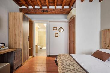 تختخواب و صبحانه Sette Angeli Rooms