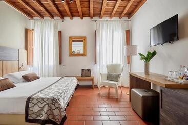 تختخواب و صبحانه Sette Angeli Rooms