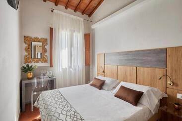 تختخواب و صبحانه Sette Angeli Rooms