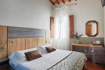 تختخواب و صبحانه Sette Angeli Rooms
