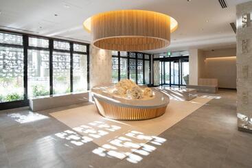 هتل Okinawa Hinode Resort And Hot Spring