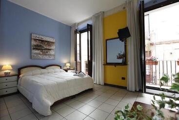 تختخواب و صبحانه Arcobaleno Rooms