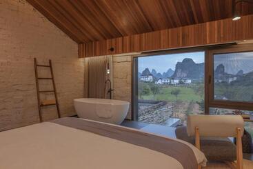 تختخواب و صبحانه Yangshuo Hillside Homestay