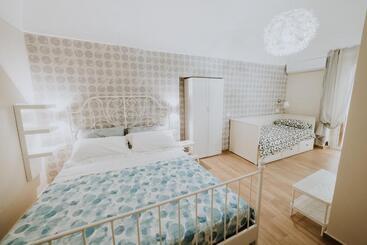 تختخواب و صبحانه La Casa Di Achille