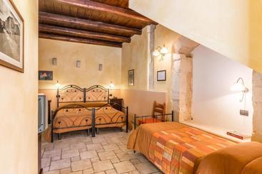 تختخواب و صبحانه Casina Di Grotta Di Ferro