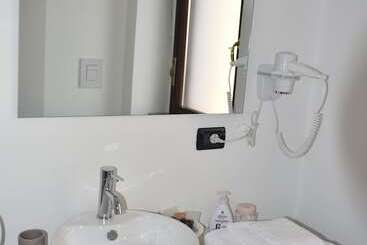 تختخواب و صبحانه élite Suite Home