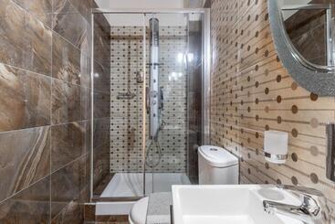 هتل Toti Boutique Rooms