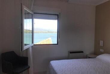 پانسیون Hostal O Portiño
