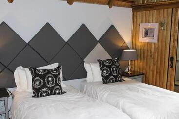 تختخواب و صبحانه Tidimalo Lodge