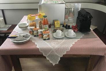 تختخواب و صبحانه Alla Rotonda Dai Santi