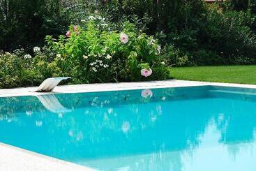 مبيت وإفطار Eco Resort Parco Botanico Fiorlago