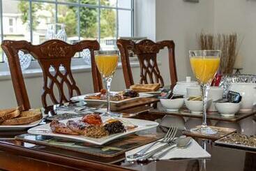 تختخواب و صبحانه Woodleigh Lodge