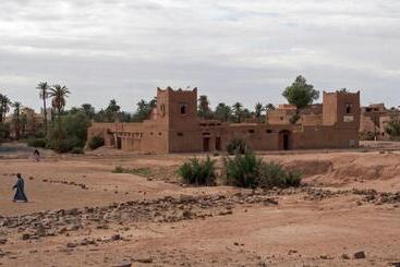 هتل Auberge L Oasis