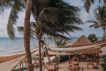 Petit Lafitte Beach Front Hotel & Bungalows