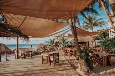 Petit Lafitte Beach Front Hotel & Bungalows