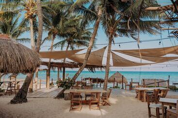 Petit Lafitte Beach Front Hotel & Bungalows