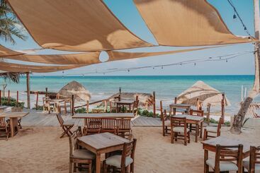 Petit Lafitte Beach Front Hotel & Bungalows