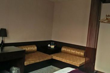 Baolong Homelike Youyi Hotel