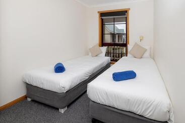 アパートホテル Kitty S Cottages   Managed By Big4 Strahan Holiday Retreat