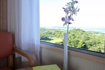 هتل Motobu Green Park And Golf Course