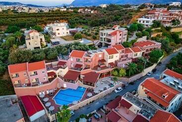 هتل Theos Village Apartments