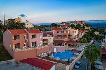 هتل Theos Village Apartments