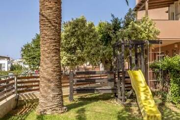 هتل Theos Village Apartments