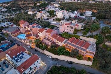 هتل Theos Village Apartments