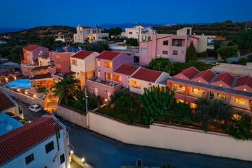 هتل Theos Village Apartments