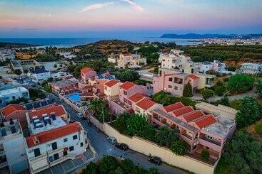 هتل Theos Village Apartments