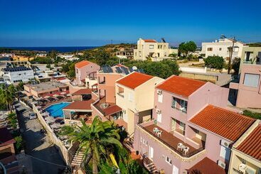 هتل Theos Village Apartments