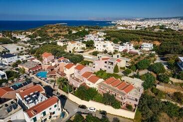 هتل Theos Village Apartments