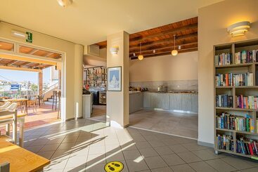 هتل Theos Village Apartments