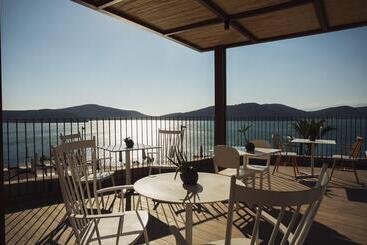 هتل Domes Aulus Elounda All Inclusive Resort, Curio By Hilton