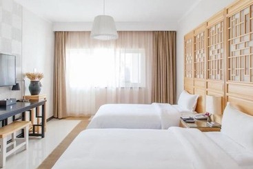 هتل Yun Jing Baishi Villa