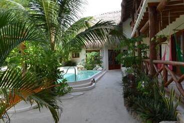 هتل Casa Iguana Holbox   Beachfront