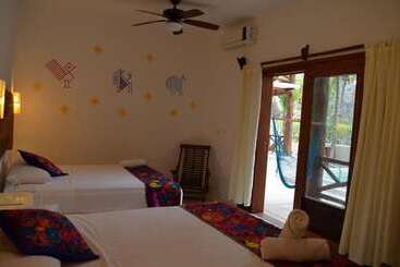 هتل Casa Iguana Holbox   Beachfront