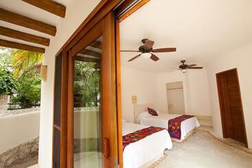 هتل Casa Iguana Holbox   Beachfront